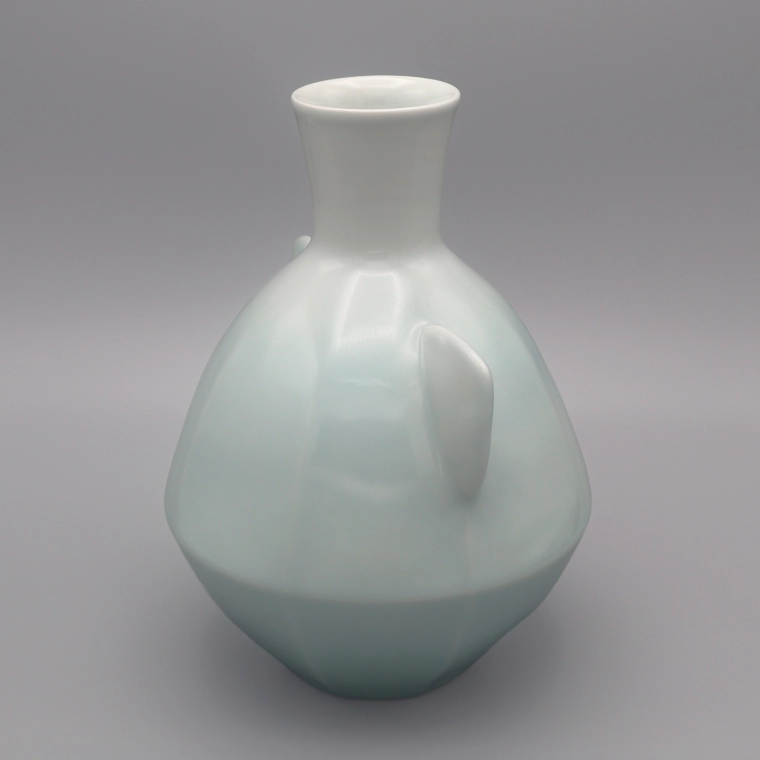 photo White Porcelain Flower Vase with Handles and Pale Blue Glaze