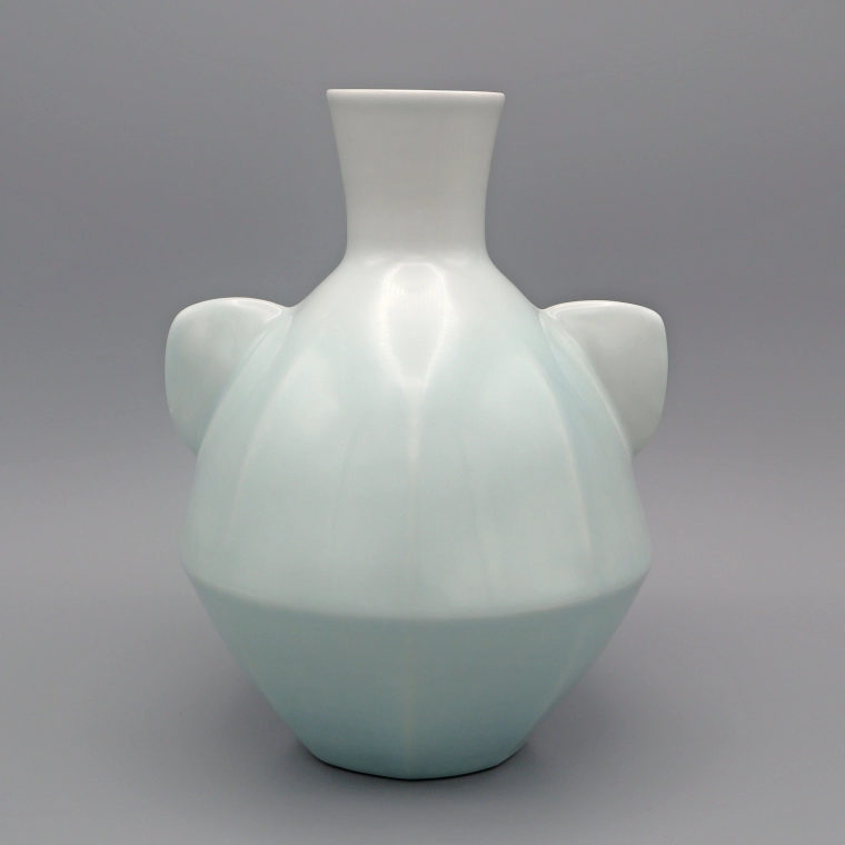 photo White Porcelain Flower Vase with Handles and Pale Blue Glaze