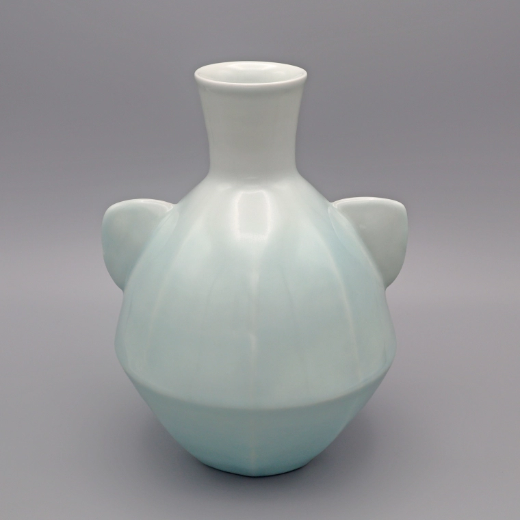 photo White Porcelain Flower Vase with Handles and Pale Blue Glaze