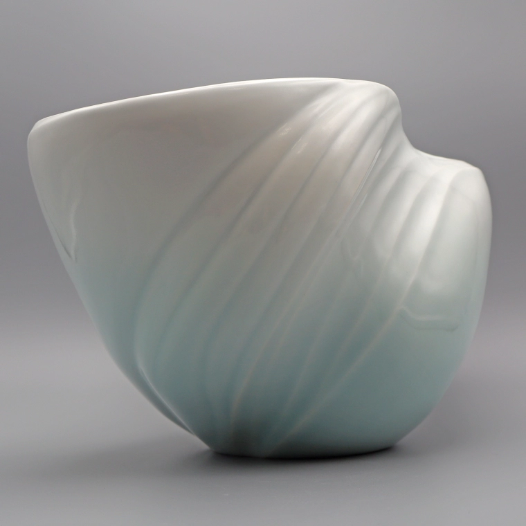 photo White Porcelain Flower Vase with Pale Blue Glaze "The Swell"