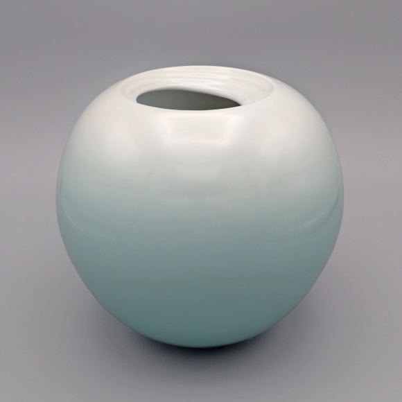 White Porcelain Jar with Pale Blue Glaze and Whirlpool Design
