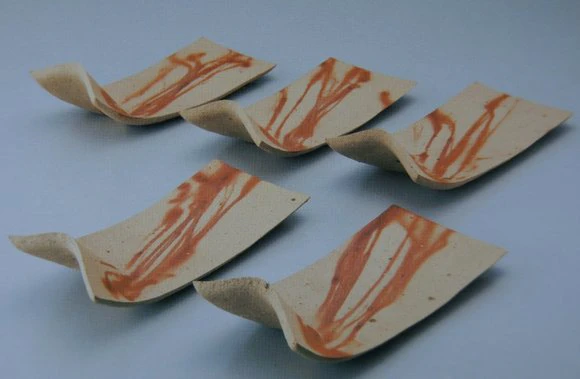Set of Bent Up Dishes with Fire Marks