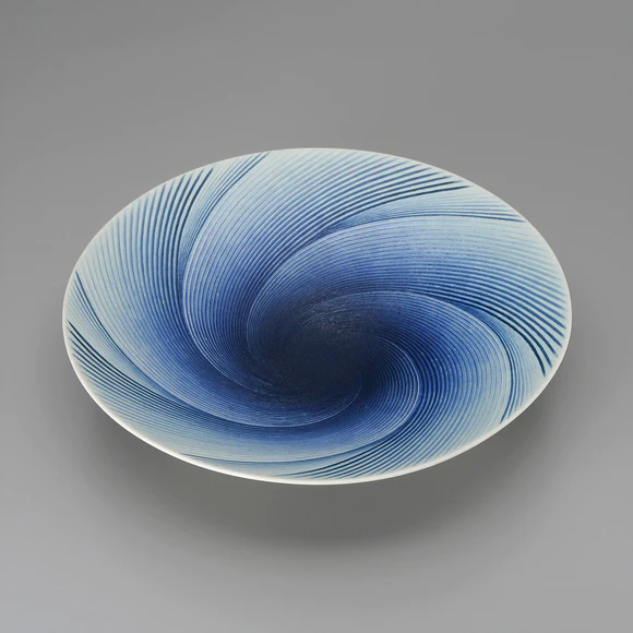 Bowl with Raised Line Whirl Design in Colored Slip