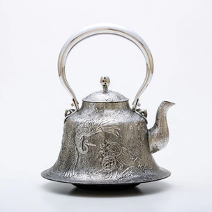 Iron Sand Kettle in Form of Spread Wings with Crane and Tortoise Design