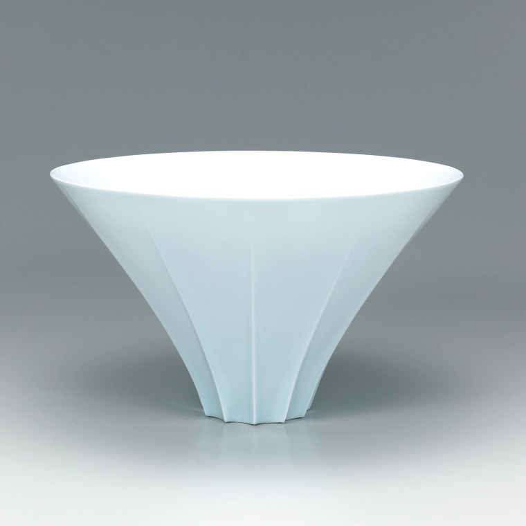 photo White porcelain bowl with pale blue glaze. “Ridges”