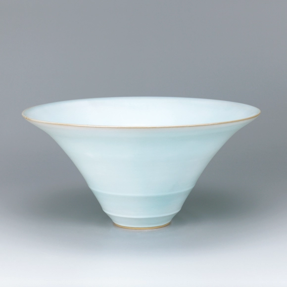 Bowl with pale blue glaze.