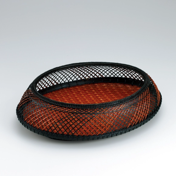 Basket with fish scale pattern. “Waves”
