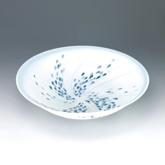 Bowl with matte glaze and drop design.