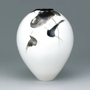 Jar with bird and flower design in black painting.