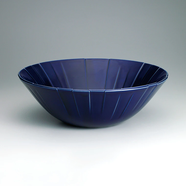 photo Bowl with purplish blue glaze.