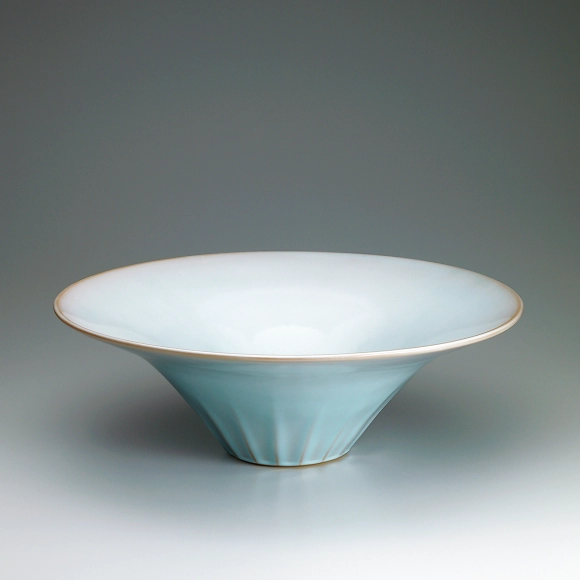 Bowl with pale blue glaze.