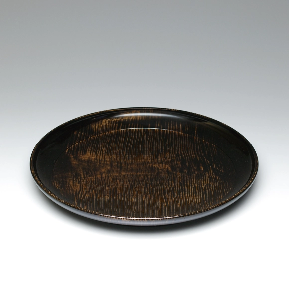Food vessel of horse chestnut wood finished in wiped urushi.