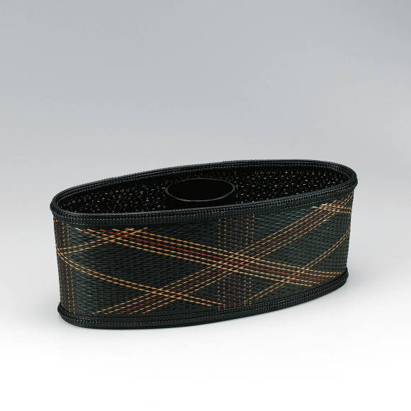 Flower basket in matsuba-ami weave. “Sunshine filtering through foliage”