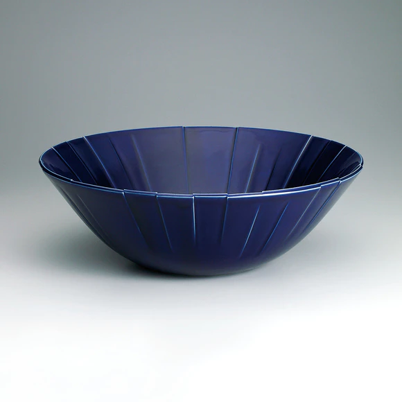 Bowl with purplish blue glaze.