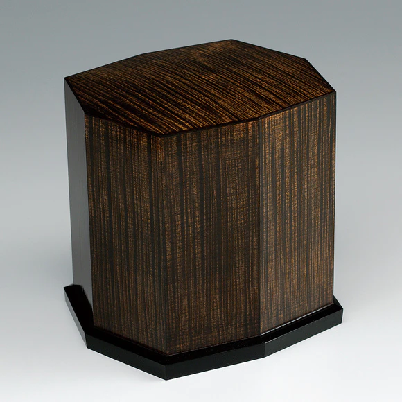 Octagonal box of horse chestnut wood.