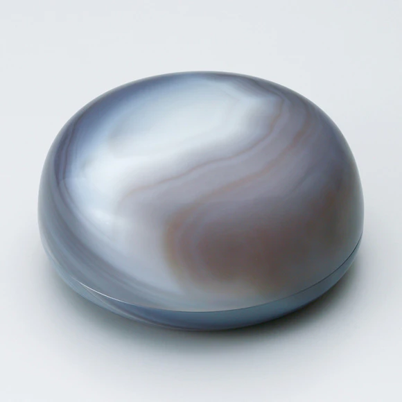 Agate covered vessel. “Lenticular cloud over the top of mountain”