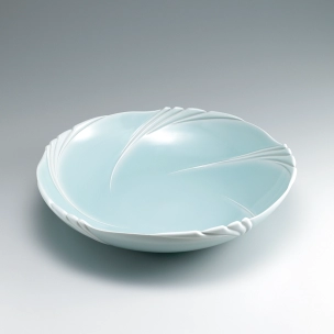 Bowl with raised clay line decoration.