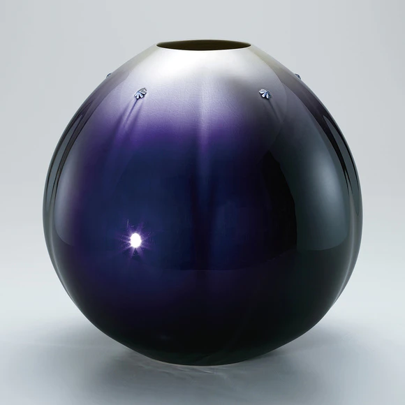 Jar with colored glaze decoration. “Capped with snow”