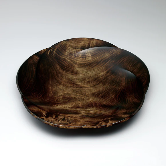 Food vessel of horse chestnut wood finished in wiped urushi.