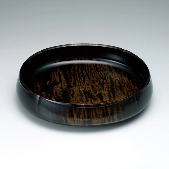 Food vessel of maple wood finished in wiped urushi.
