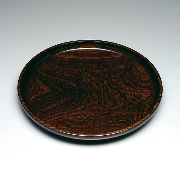 Food vessel of zelkova wood finished in wiped urushi.