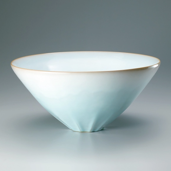 Bowl with pale blue glaze.