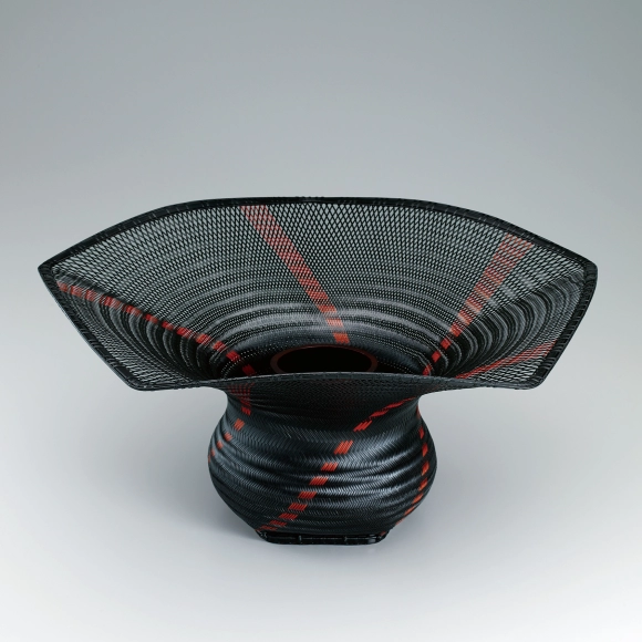 Flower basket in sukashi-ajiro weave. “Distant thunder”