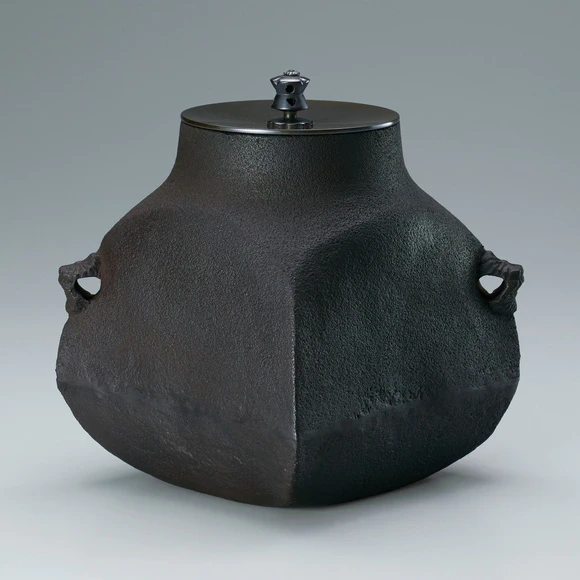 Square tea ceremony kettle of “crane neck” type.