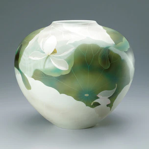 Large jar with lotus design in underglaze spraying.