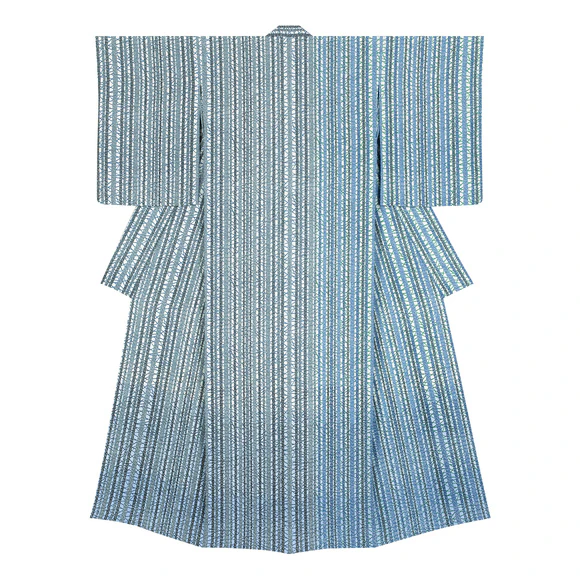 Kimono with design in stencil resist picture dyeing. “Waiting for spring”