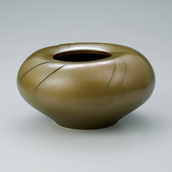 Brass flower vessel. “Flower bud”