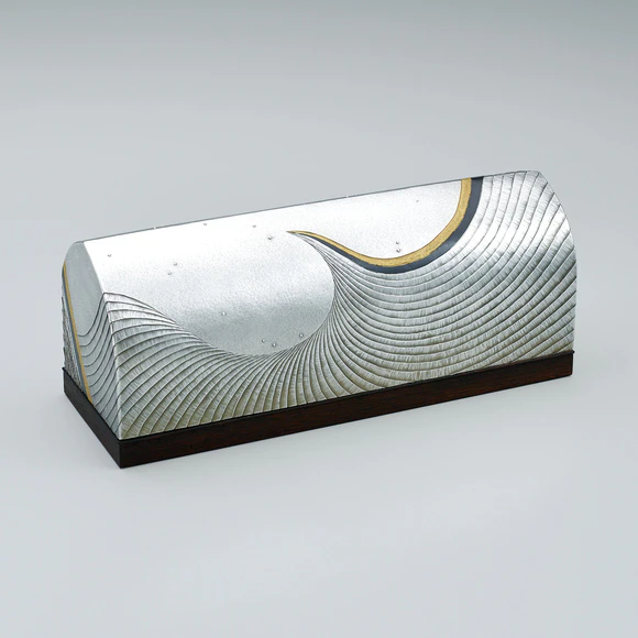 Rectangular silver box. “To the stars”