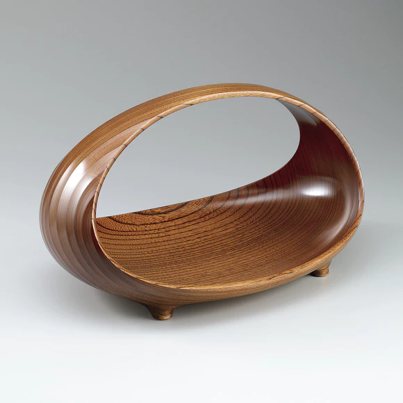 Vessel of zelkova wood finished in wiped urushi. “Circle”