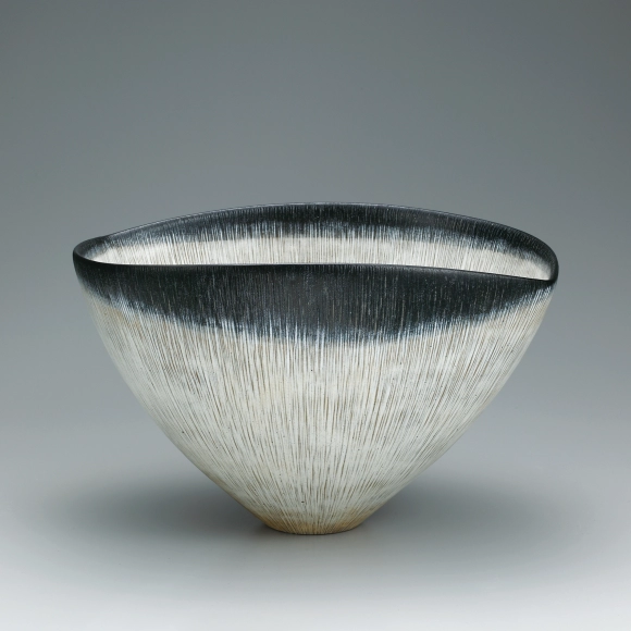 Large bowl with design in line engraving.