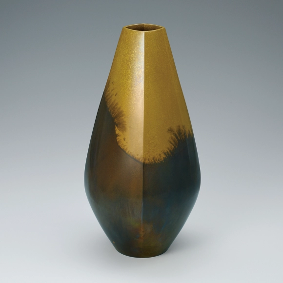 Flower vessel cast in lost wax casting method in two different metals.