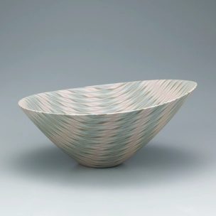 Marbled bowl in irregular shape with sasa bamboo leaf design.