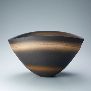 Deep bowl with layered glaze.