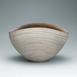 Vessel with multiple layer pattern and colored decoration.