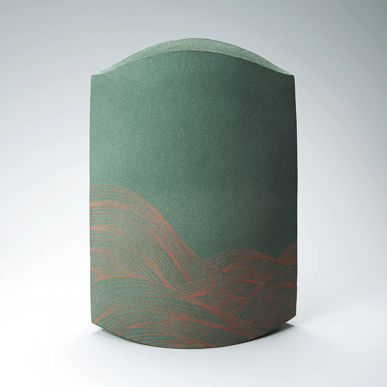 photo Flower vessel with colored slip decoration, wavy line and engraved design.