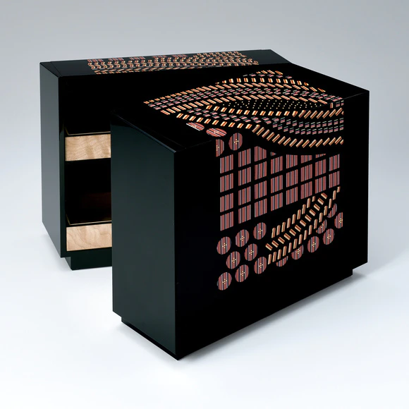 Small chest of drawers with kozane (small plates which consist Japanese armor) design in urushi carving and inlay.