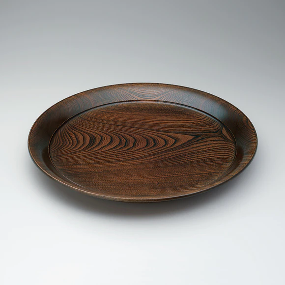 Food vessel of zelkova wood finished in wiped urushi.