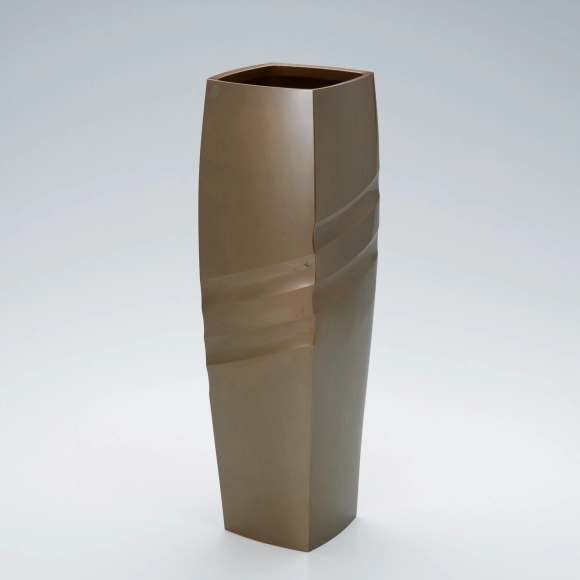 Square flower vessel of brass.
