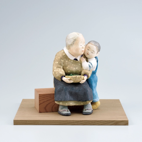 “What are you doing?” Formed with toso over wooden core and covered with paper