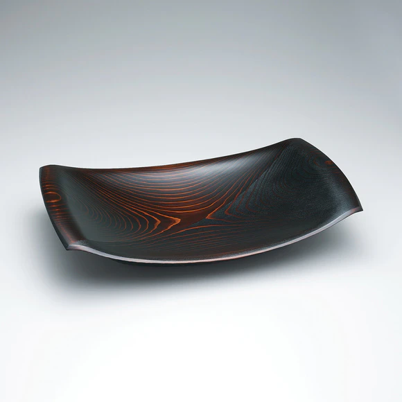 Food vessel of cedar wood with half of the surface polished with sand.