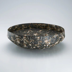 Bowl with colored slip inlay.