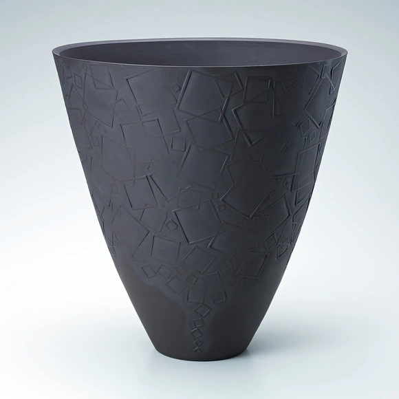 Banko black bowl with square pattern.