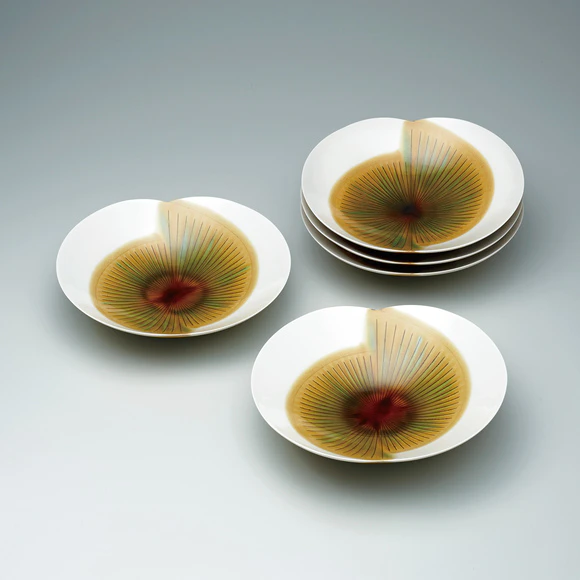 Set of bowls with running colored glaze decoration