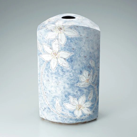 Jar with design in chalk drawing. “Sublimation to higher stage”