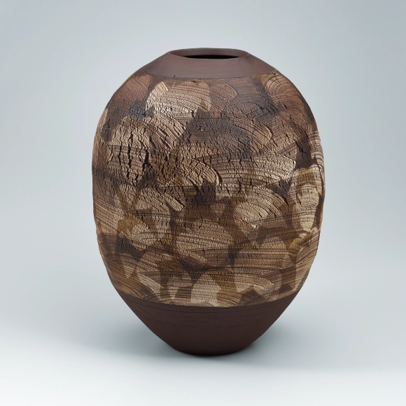 Jar with ivy design in iron painting.