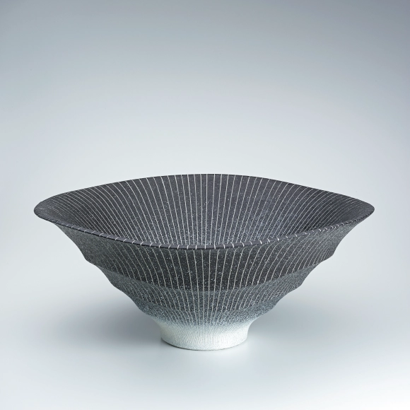 Bowl with colored slip and inlay. “Moon reflected on water”